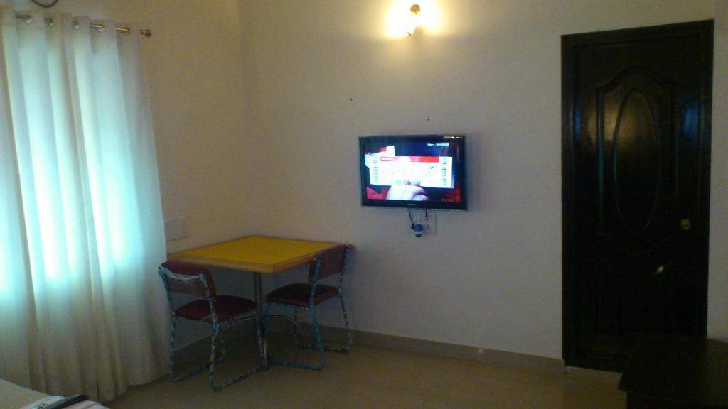 Airport Residency Hotell Devanahalli Rom bilde