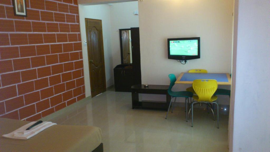 Airport Residency Hotell Devanahalli Rom bilde