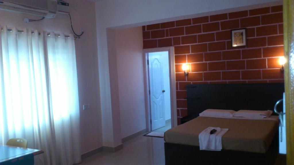 Airport Residency Hotell Devanahalli Rom bilde